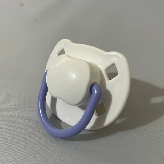 purple and white Spanish style dummy